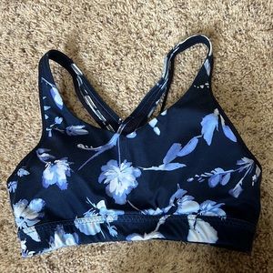 Hardly worn Athleta floral strappy sports bra in blue - size small!